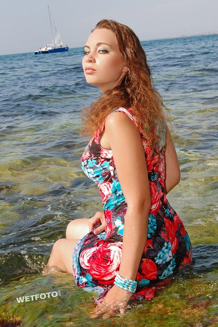 wet girl get wet wet hair swim fully clothed sundress high heels sandals sea