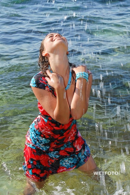 wet girl get wet wet hair swim fully clothed sundress high heels sandals sea