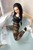 wet girl get wet wet hair leggings top socks sneakers bath