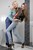 wet girl get wet wet hair leather jacket jeans blouse shirt tights high heels bath