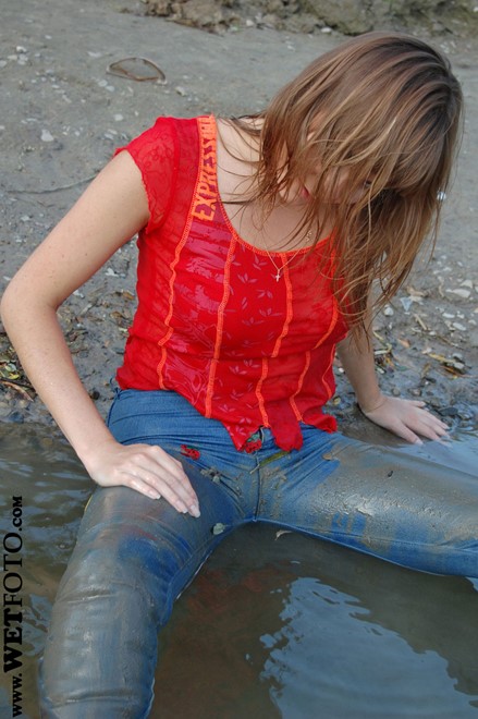 wet girl get wet wet hair fully clothed jeans blouse high heels shoes lake