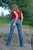 wet girl get wet wet hair fully clothed jeans blouse high heels shoes lake