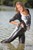 wet girl get wet swim fully clothed wet hair leather jacket leggings high heels