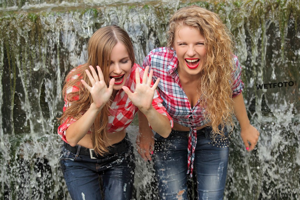 wet girl wet hair get wet shirt tight jeans sneakers water waterfall