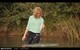 wet girl wet hair get wet blouse leggings high heels swim fully clothed water lake