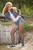 wet girl wet hair get wet denim jacket short tights sneakers