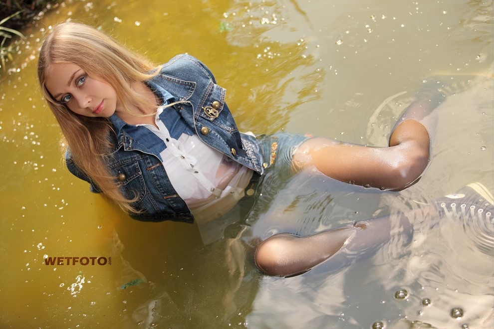 wet girl wet hair get wet denim jacket short tights sneakers