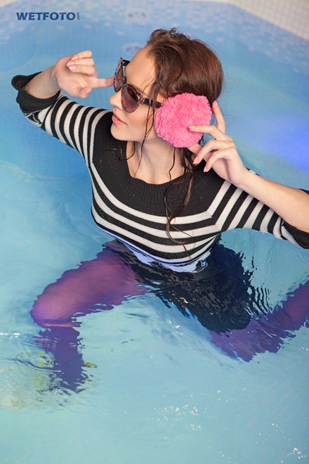 wet girl wet hair get wet blouse mini skirt swimsuit tights sneakers fully soaked spa