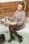 wet girl wet hair get wet business suit skirt tights hand bag high heels fully clothed fully soaked bath