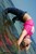 wet girl get wet wet hair fully clothed jeans t-shirt roller-skates sea