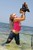 wet girl get wet wet hair fully clothed jeans t-shirt roller-skates sea