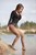 wet girl wet hair get wet tricot denim overalls high heels boots swim fully clothed lake