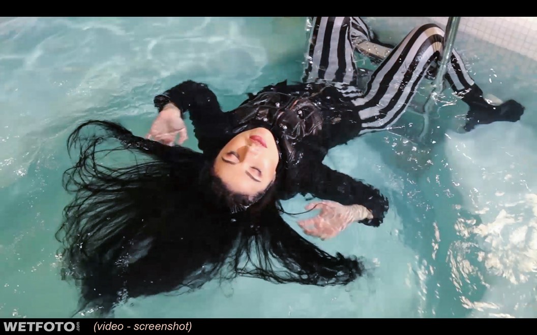 wet girl wet hair get wet top leather jacket leggings high heels fully soaked swim fully clothed pool
