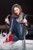 wet girl wet hair get wet top leather jacket tight jeans sneakers fully soaked spa