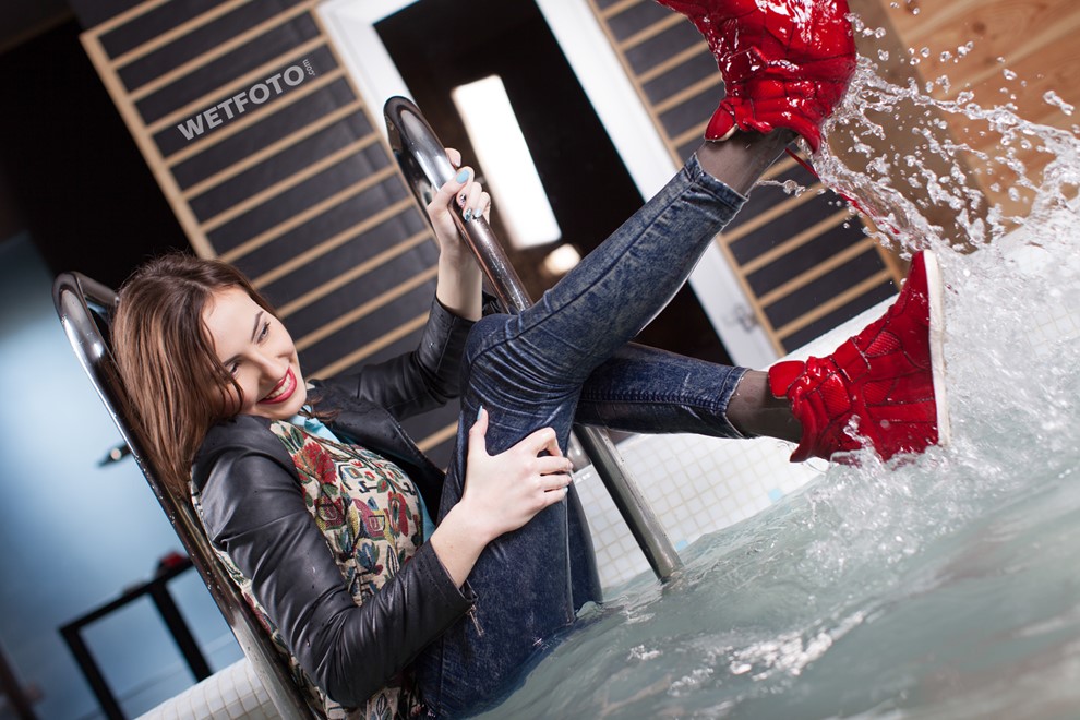 wet girl wet hair get wet top leather jacket tight jeans sneakers fully soaked spa