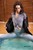 wet girl wet hair get wet coat shirt skinny jeans socks high heels fully soaked spa