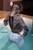 wet girl wet hair get wet coat shirt skinny jeans socks high heels fully soaked spa