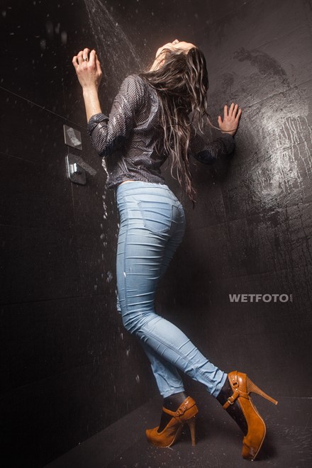 wet girl wet hair get wet coat shirt skinny jeans socks high heels fully soaked spa