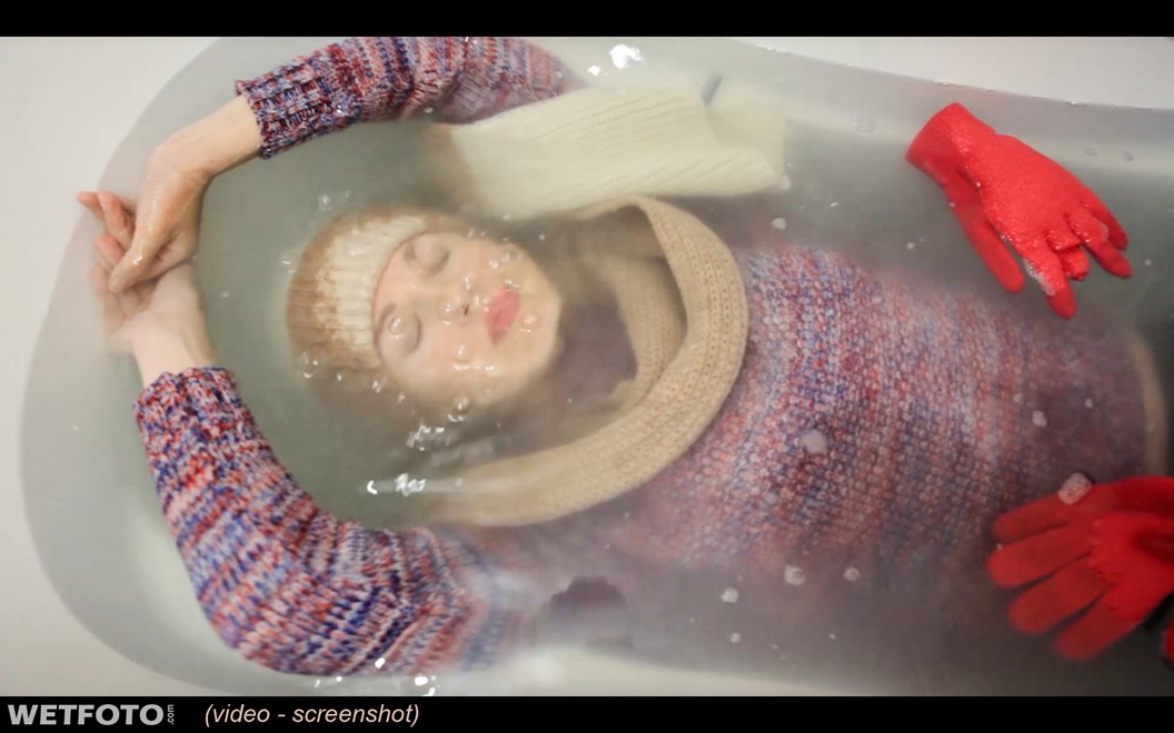 wet girl wet hair get wet sweater tight jeans scarf hat gloves tights socks high heels fully soaked jacuzzi bath