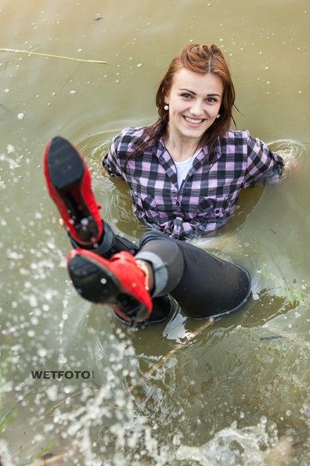 wet girl wet hair get wet checkered shirt t-shirt tight jeans boots high heels lake