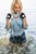 wet woman wet hair get wet leather jacket denim shirt short shorts tights high heels boots lake