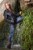 wet girl wet hair get wet sweater jacket tight jeans leather boots waterfall