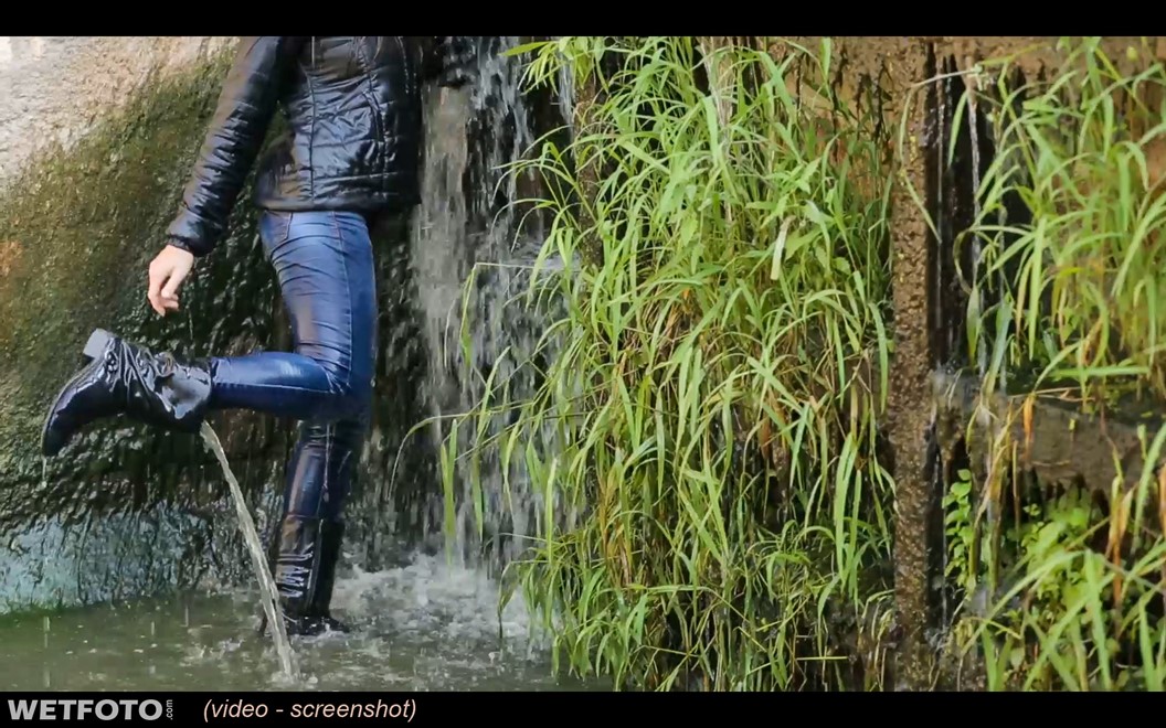 wet girl wet hair get wet sweater jacket tight jeans leather boots waterfall