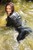 wet woman wet hair get wet leather jacket blouse leggings high heels shoes lake