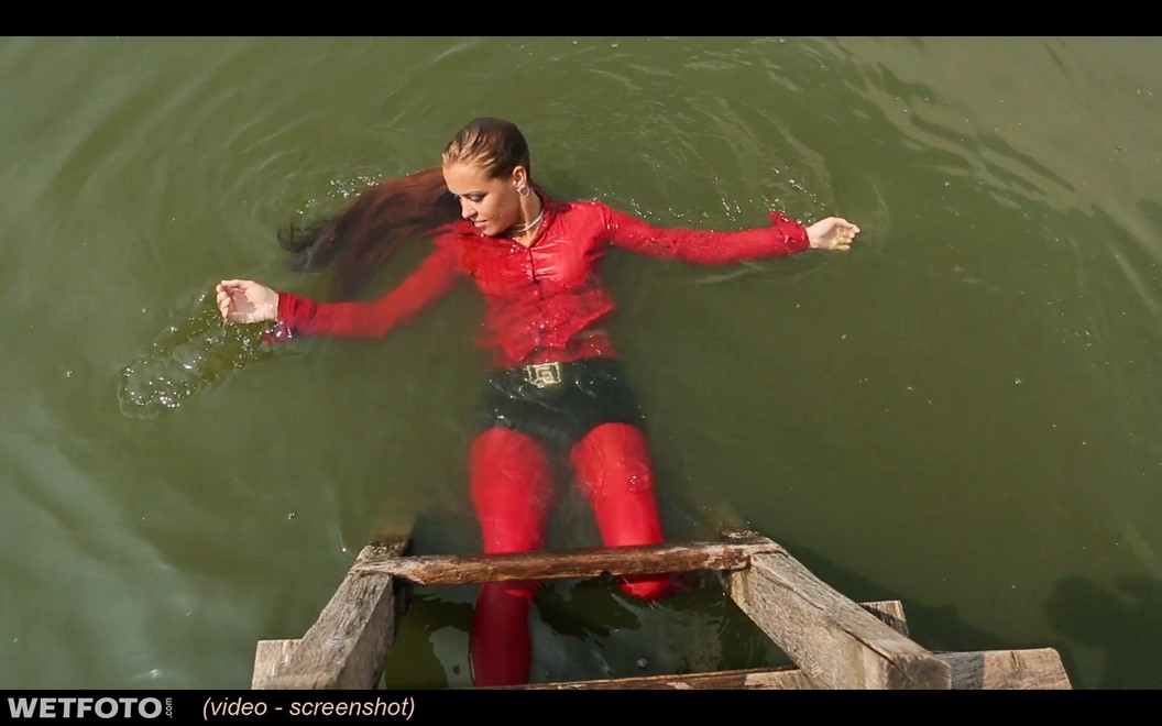 wet girl wet hair get wet blouse denim shorts stockings high heels boots swim fully clothed lake