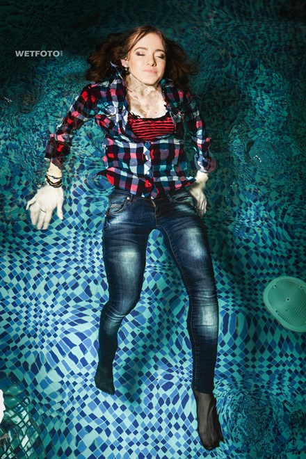 wet girl brunette wet hair get wet soaked fully clothed swim tight jeans tights bodysuit shirt jacket boots jacuzzi