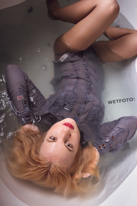 wet girl fully clothed wet get wet soaking wet vest denim shirt jeans high heels jacuzzi