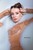 wetfoto girl takes milk bath