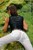 wet girl get wet wet hair fully clothed t-shirt pants high heels sea