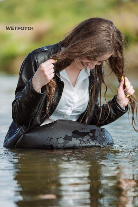 wetfoto wet fully clothed girl in the lake
