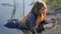 wet girl wet hair get wet swimming fully clothed blouse tight pants tights lake mud