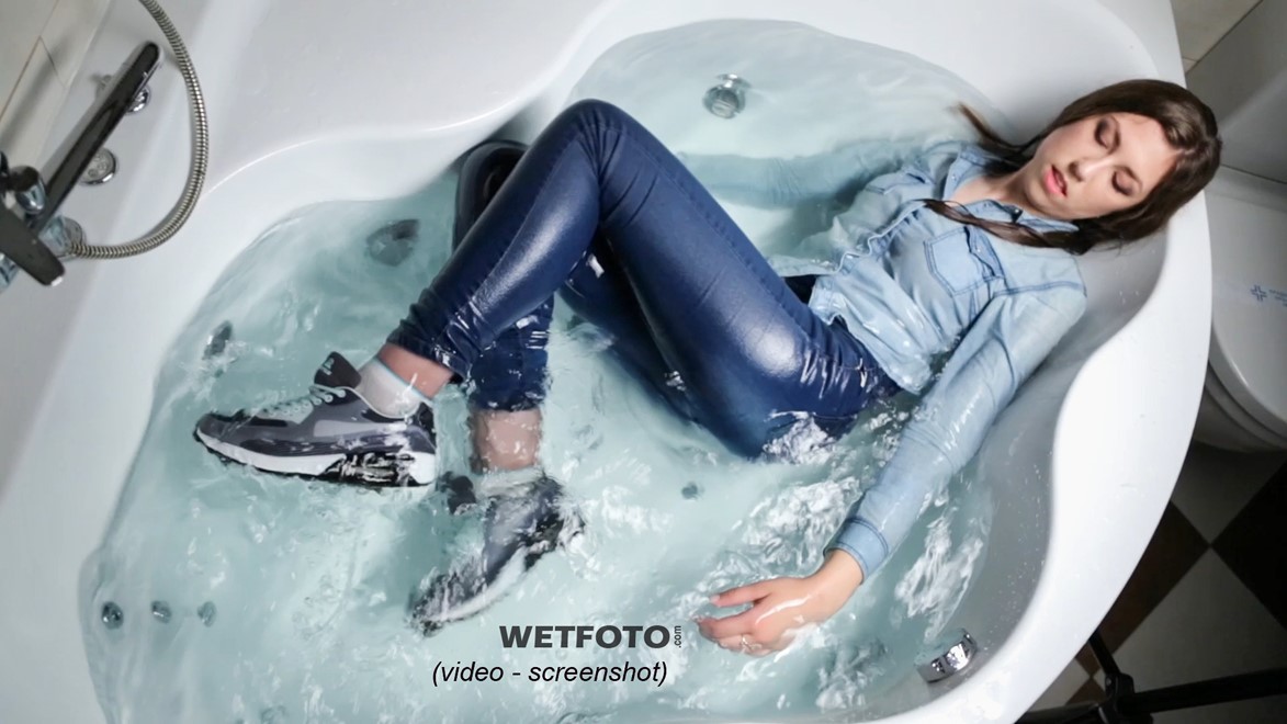 wet girl wet hair get wet fully clothed tights denim shirt tight jeans sneakers shower jacuzzi