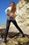 wet woman get wet wet hair fully clothed blouse tight jeans leather boots high heels