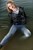 wet girl wet hair get wet swimming fully clothed tights leather jacket skinny jeans lake