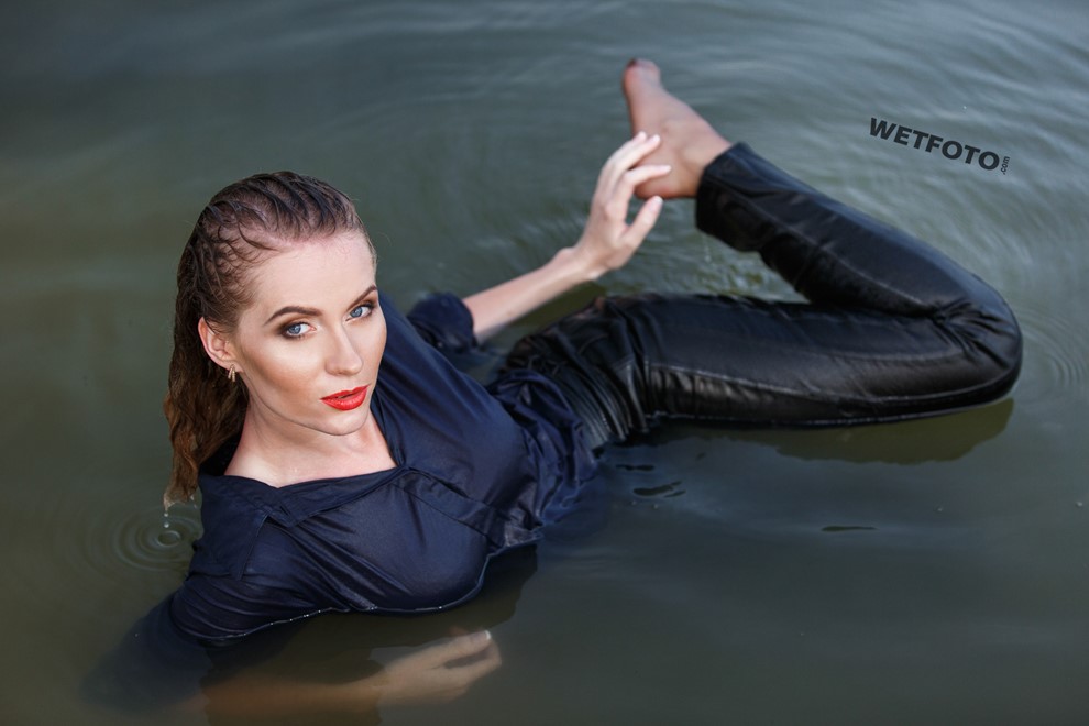 wet girl wet hair get wet swimming fully clothed shirt leather pants high heels lake