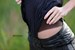 wet girl wet hair get wet swimming fully clothed shirt leather pants high heels lake