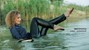 wet girl wet hair get wet swimming fully clothed shirt leather pants high heels lake