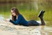 wet girl woman wet hair get wet soaked swim fully clothed skirt leather stockings blouse sneakers lake water