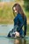 wet girl woman wet hair get wet soaked swim fully clothed skirt leather stockings blouse sneakers lake water