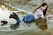 wet girl woman wet hair get wet soaked swimming jeans t-shirt boots high heels lake