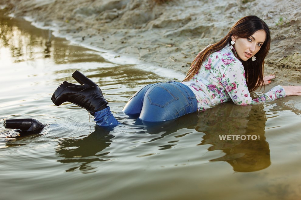 wet girl woman wet hair get wet soaked swimming jeans t-shirt boots high heels lake