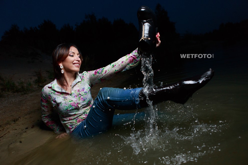 wet girl woman wet hair get wet soaked swimming jeans t-shirt boots high heels lake