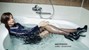 girl wet fully clothed soaked wet hair water skirt blouse stockings boots high heels jacuzzi bath shower