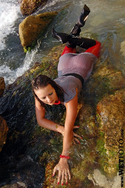wet girl get wet wet hair fully clothed dress stockings boots high heels sea