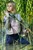 blonde wet girl swim fully clohed wet hair blouse skinny jeans jacket high heels lake