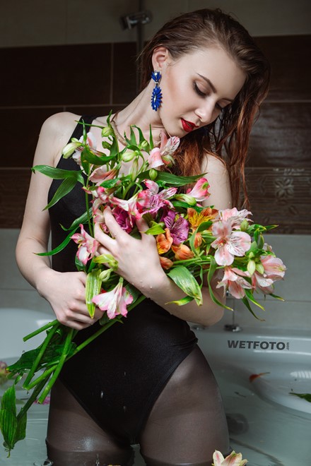 wetlook girl with flowers get wet water clothed bodysuit tights bathroom wetfoto